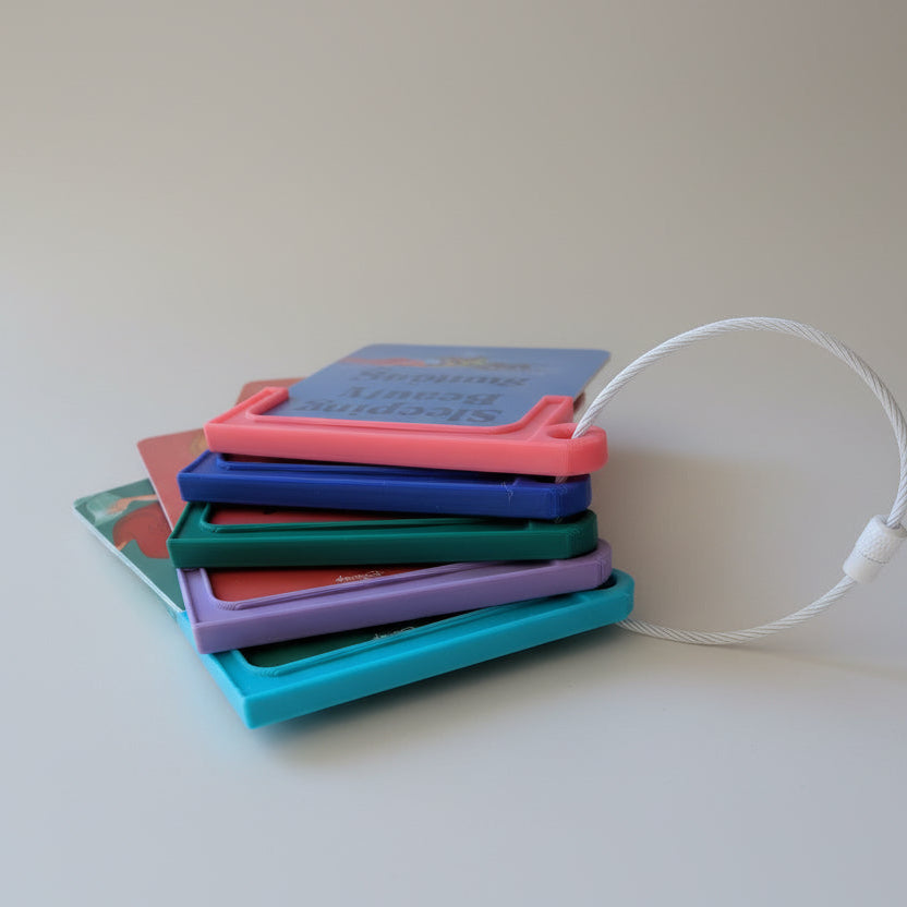 Colourful Yoto card cases with 'Sleeping Beauty' branding on a light background