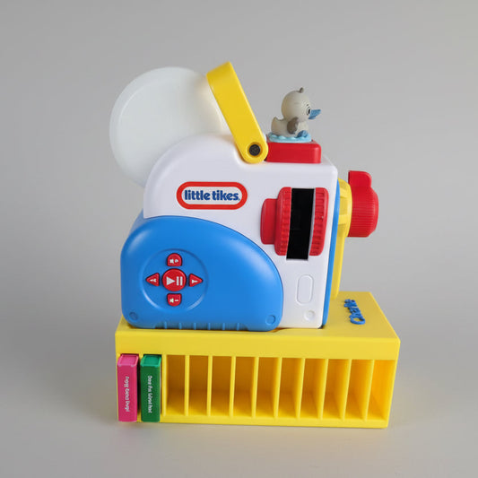 little tikes dream machine on a storage stand